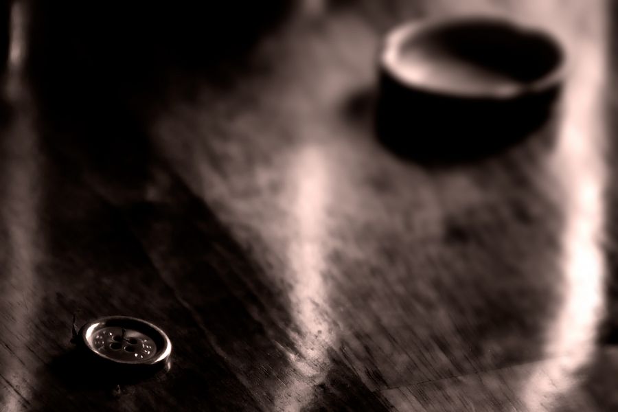 a button and a bottle cap