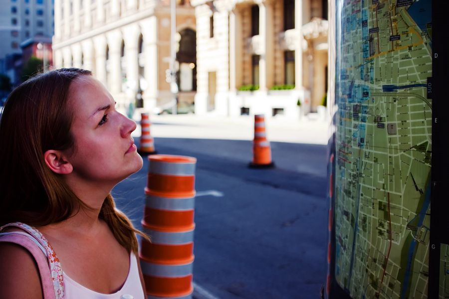 samantha-matthes-studying-a-map-in-montreal